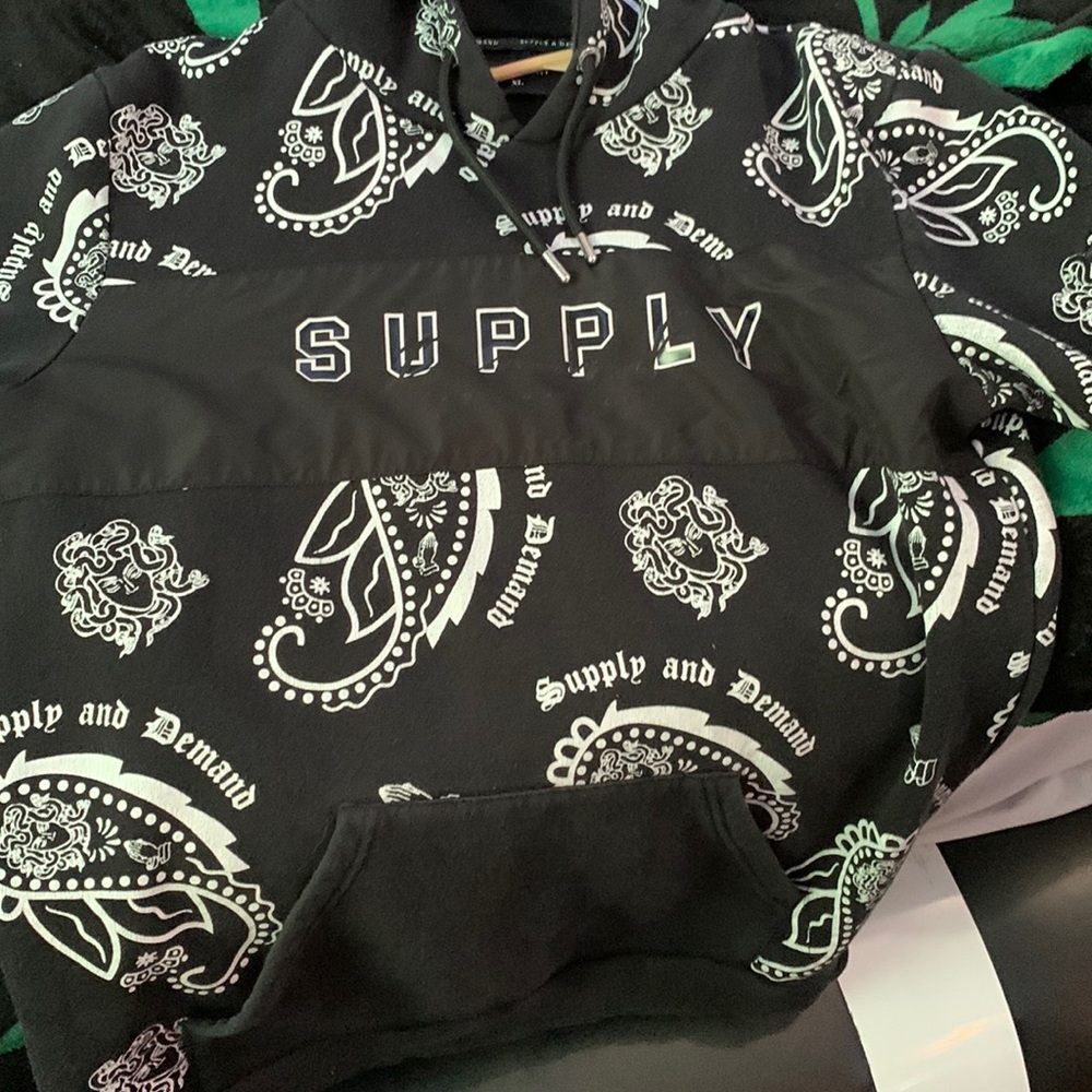 A supply and demand sweater